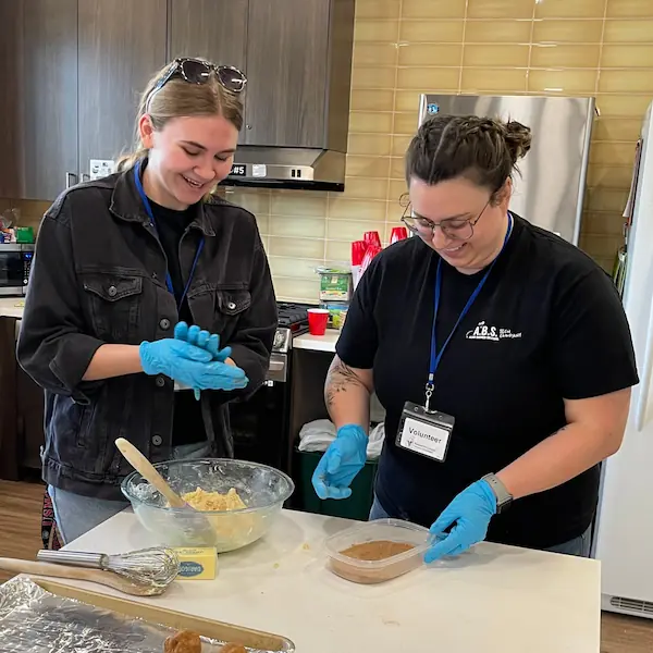 Two Allied employees baking